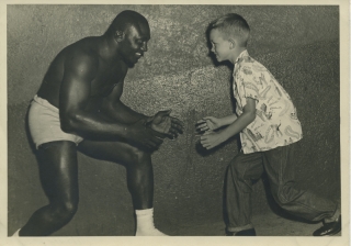 1949-Pat with wrestler